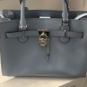 Gently used Pale Blue MK Hamilton purse.